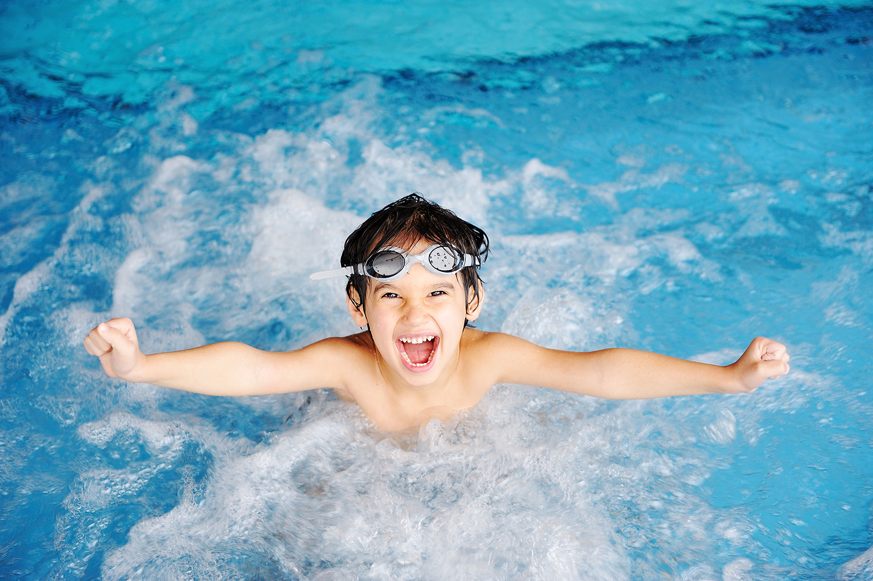 Optisport Blue Rangers. Kinderen hebben plezier in het water en hebben een onvergetelijke ervaring in een zwembad van Optisport.